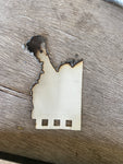 Burnt remains of a portrait of Keith Richards 2022